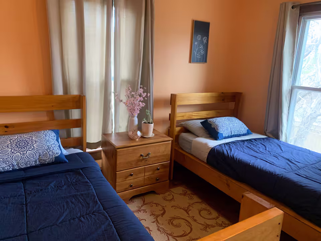 Twin bedroom at Ananda Viplava farmhouse