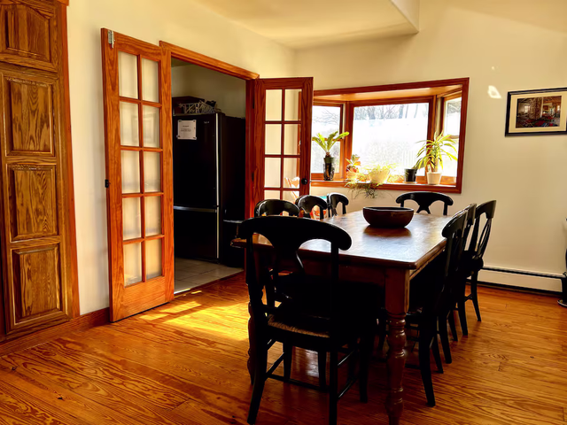 Dining room with natural light at Ananda Viplava